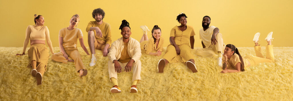 Group of people on yellow background
